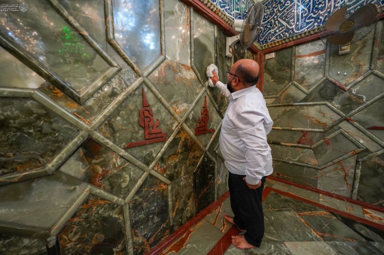 Dusting Amir al-Miminin Shrine
